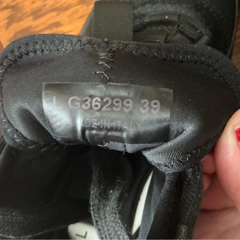 CHANEL Black Women’s Sneakers with Gold Logo